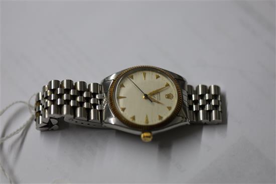 A gentlemans 1950s? stainless steel and gold Rolex Oyster Perpetual Air King wrist watch,